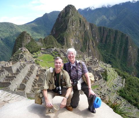 Ron Amey on a stone overlook at Machu Picchu.